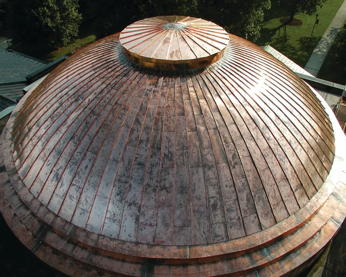 Craftsman Roofing crew installing a new roof in Brookhaven